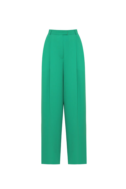 Pleated trousers in green silk