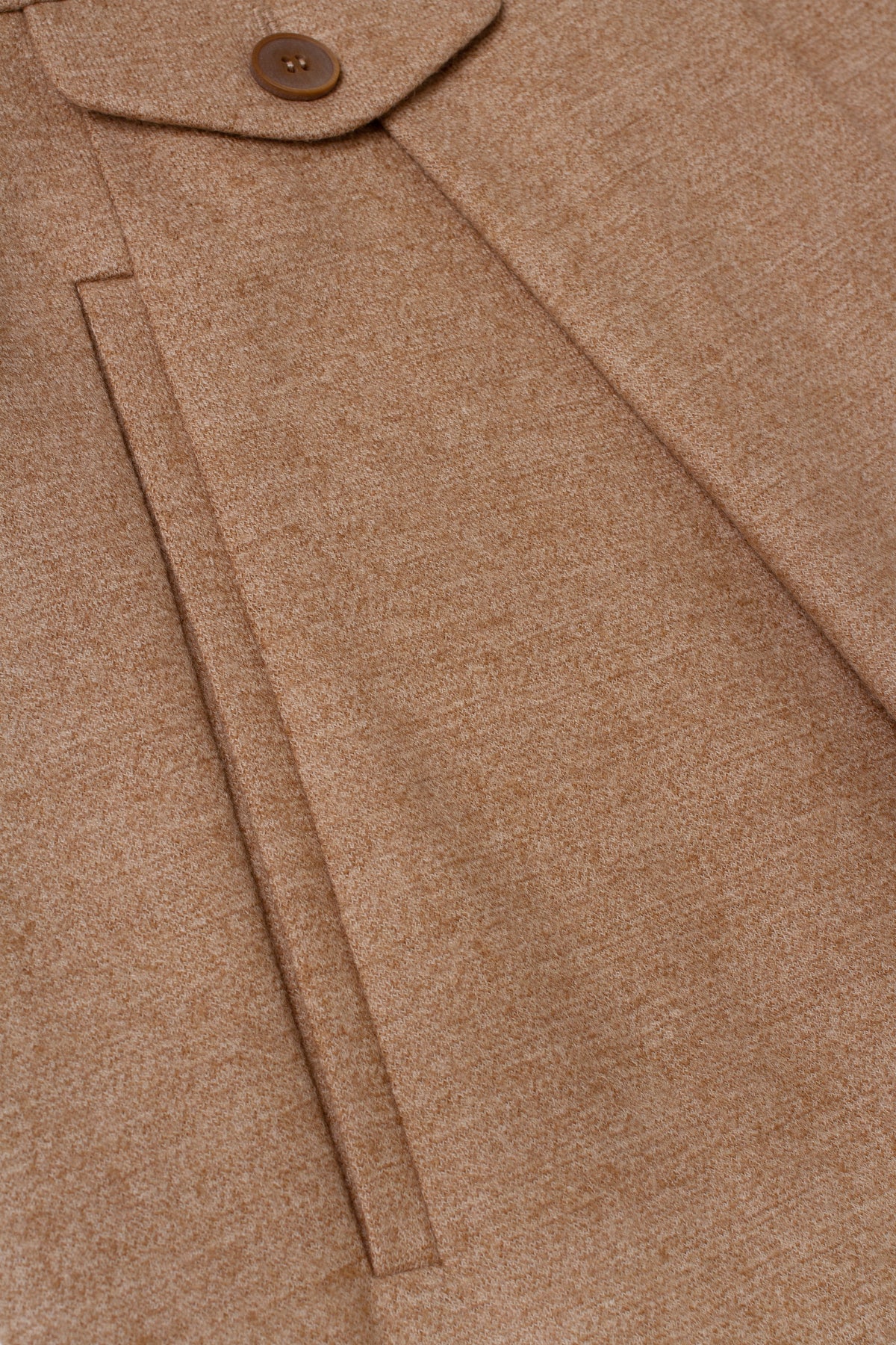 Pleated trousers in soft beige